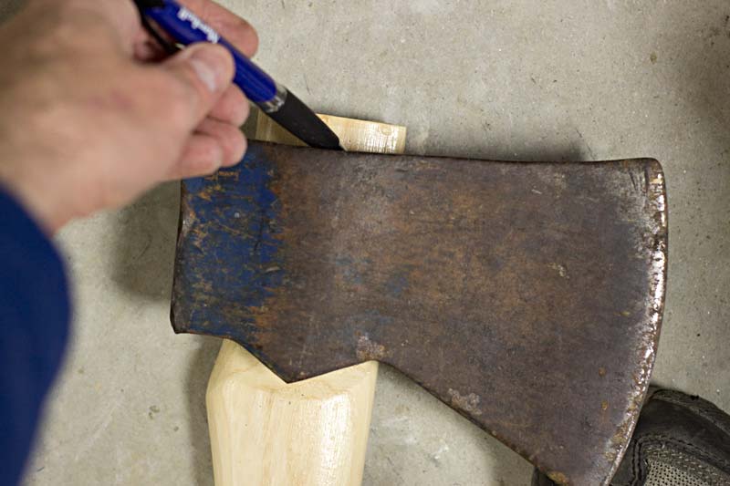 Tracing the top of the ax onto the ax handle